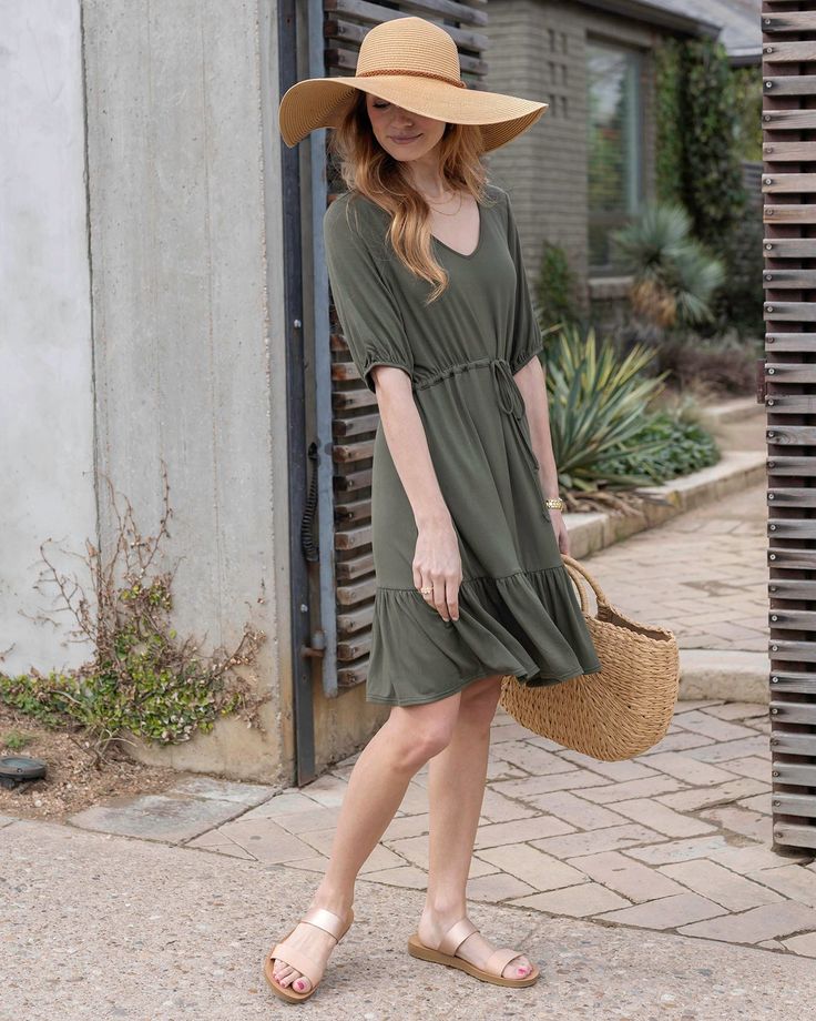 Olive Modal Waist Tie Dress | Olive Modal Dress Casual and comfortable! Meet the new Modal Waist Tie Dress! Crafted from luxurious jersey knit modal, this dress combines comfort with style seamlessly. Whether you're brunching with friends or strolling through the farmers market, this comfy favorite is ready to be your new go-to dress! Why you’ll love it: Buttery soft, stretchy modal dress in olive Flattering v-neckline with ruffle hemline and pockets! Comfortable, adjustable waist tie for a cust Casual Stretch Midi Dress For Brunch, Flowy Casual Mini Dress For Loungewear, Casual Flowy Mini Dress For Loungewear, Casual Rayon Dresses For Loungewear, Flowy Casual Dresses For Loungewear, Casual Flowy Loungewear Dresses, Rayon Dress For Brunch, Green Rayon Midi Dress Casual, Green Rayon Midi Dress Casual Style