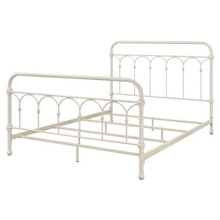 a white metal bed frame with an arched headboard and foot board is shown in front of a white background