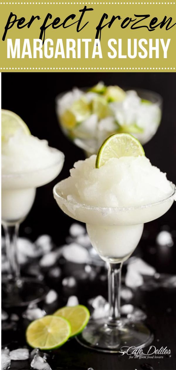 margarita slushy in martini glasses with limes on the side