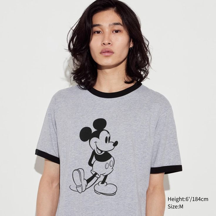 Mickey Mouse's iconic standing pose, as depicted by Disney's top creators. Trendy T-shirt With Character Print For Disney Fan Events, Disney Mickey Mouse T-shirt For Streetwear, Disney Graphic Print Crew Neck T-shirt, Disney Streetwear T-shirt With Letter Print, Disney Letter Print T-shirt For Streetwear, Mickey Mouse Cotton T-shirt For Streetwear, Disney Short Sleeve T-shirt With Letter Print, Disney Short Sleeve Letter Print T-shirt, Graphic Tee T-shirt For Disney Fan Events