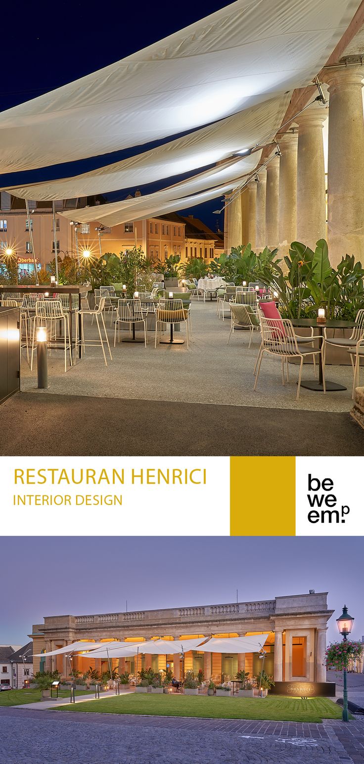 an outdoor event venue with tables and chairs under a canopy at night, lit up by street lamps