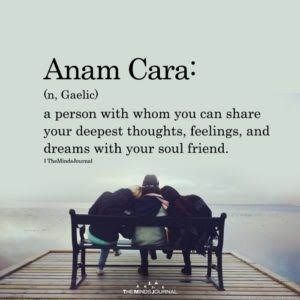 two people sitting on a bench with their backs to each other and the words amam cara above them