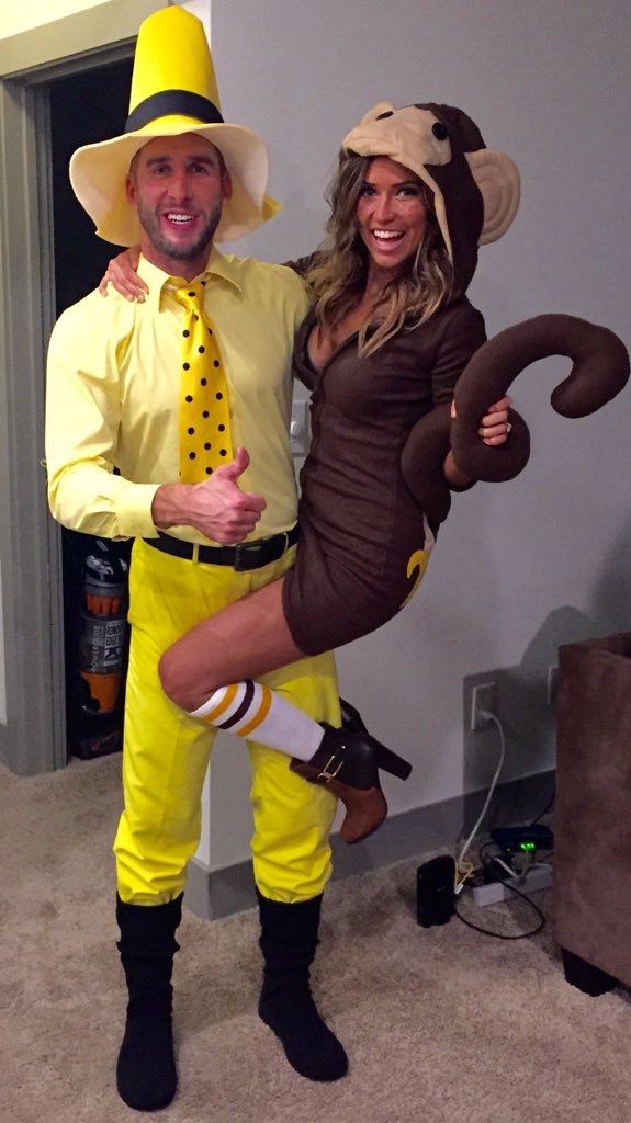 a man and woman dressed up in costumes