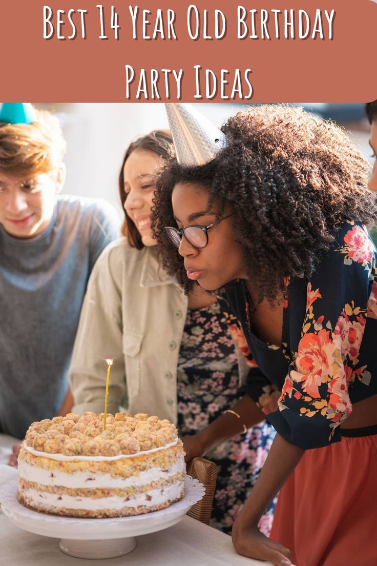 a woman blowing out candles on a birthday cake with other people around her looking at it