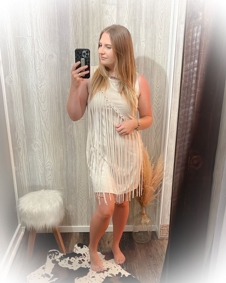 Fringe Dress Western Dress Product Details - Natural color - Super soft - Asymmetrical Fringe - Fits true to size ~ XS 0-2 ~ Small 2-4 ~ Medium 6-8 ~ Large 10-12 ~ XL 14-16 ~ XXL 18-20 Material & Care - 92% Polyester - 8% Spandex - Hand wash cold - Hang dry or lay flat to dry Casual Asymmetrical Dress For Fall Party, Beige Sleeveless Dresses For Night Out, Beige Sleeveless Dress For Night Out, Sleeveless Beige Dresses For Night Out, Chic Beige Fringe Dresses, Casual Beige Party Dress, Beige Casual Party Dress, Beige Summer Dress For Night Out, Chic Fringe Mini Dresses