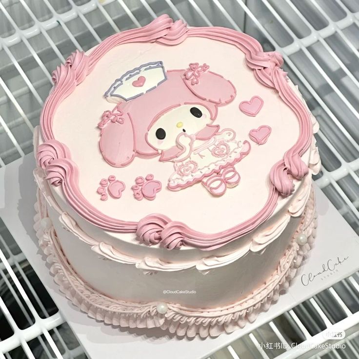 there is a cake that looks like a baby girl on the shelf in the store