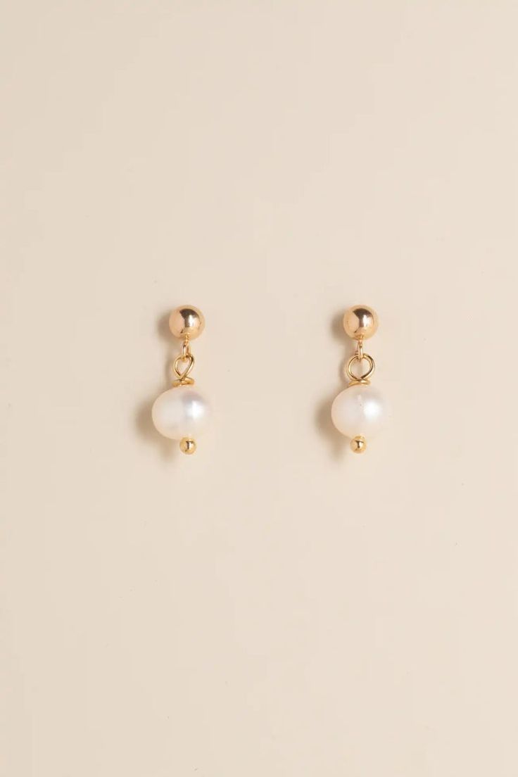 Elegant, minimal and beautiful, the Circe pearl drop are a timeless yet stylish pair of earrings, that will match any outfit and elevate your already amazing style. *Due to the unique nature of the pearls, the colors and shapes may vary slightly from the picture shown. Details: Material: 14k gold-filled Material: 925 Sterling SIlver Handcrafted Gemstone: Natural baroque pearl Hypoallergenic and Tarnish resistant Water Resistant Pearl Drop Earrings Gold, Unique Nature, Silver Drop Earrings, Jewelry Case, Gold Filled Jewelry, Polish Jewelry, Pearl Drop Earrings, Pearl Drop, Baroque Pearls