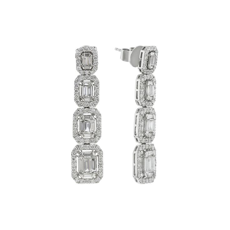 Make a statement with Steven Singer's luxurious Windsor Diamond Drop Earrings! Featuring 3 1/5 carat total weight of diamonds in a unique combination of baguette cut and round brilliant diamonds all set in high quality 14 karat gold, these earrings are the epitome of luxury. Add sophistication and glam to any outfit with these stunning statement pieces. Diamond Drops, Baguette Cut, Diamond Drop Earrings, Top Gifts, Brilliant Diamond, Wedding Shop, Round Brilliant, Windsor, Statement Pieces