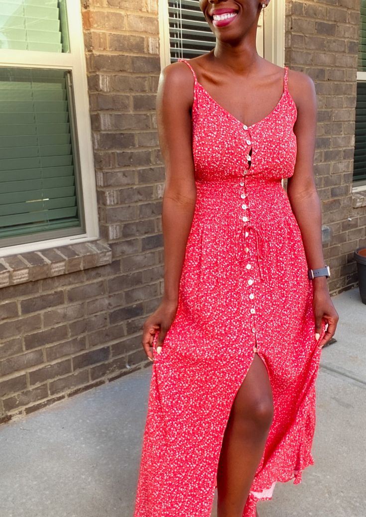 Spring is here and floral sundresses are all the rage! This beautiful red floral midi dress is no exception. It is light and flowing. The perfect outfit for a summer or spring day! Toss on a pair on sneakers, cute wedges, or comfy flip flops and you’re ready to go in this dress! This dress features a front button closure, is mid calf length and has adjustable straps. It fits true to size. Model is 5’4 and is wearing a size Small. 100% rayon Midi dress Fit and flare Adjustable spaghetti strap Fro V-neck Midi Dress With Ditsy Floral Print For Summer, Trendy Sleeveless Spring Sundress, Trendy Sleeveless Sundress For Spring, Trendy Sleeveless Maxi Dress For Spring, Casual Sundress For Summer, Casual Red V-neck Midi Dress, Summer Ditsy Floral Print Sundress For Day Out, Trendy Floral Print Sundress For Beach, Trendy Floral Print Beach Sundress