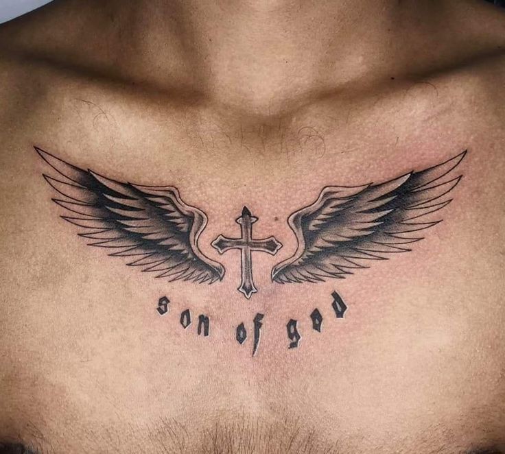 a chest with an angel and cross tattoo on it's chest, which reads days of sons