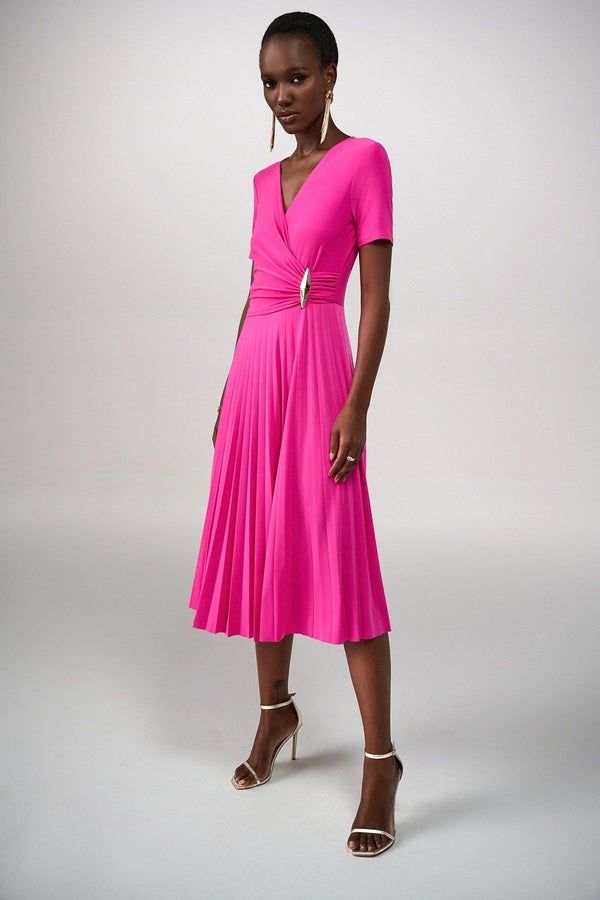 True refinement starts with this classy look from Joseph Ribkoff. Designed in a stretchy fabric that conforms to your figure, the style's surplice neckline is a graceful detail. A voluminous, pleated skirt gives the look a playful touch, making this the ideal outfit for days or evenings. 96% Polyester, -4% Spandex No pockets No zipper Cold water hand wash or hand wash cycle Do not bleach Hang to dry Do not tumble dry Low iron Do not dry clean Wash garment inside out Wrap Dress Styles, Joseph Ribkoff Dresses, Animal Print Tote Bags, Midi Dress Style, Leopard Print Scarf, Fur Lined Boots, Surplice Neckline, Knit Wrap, Leggings Sale