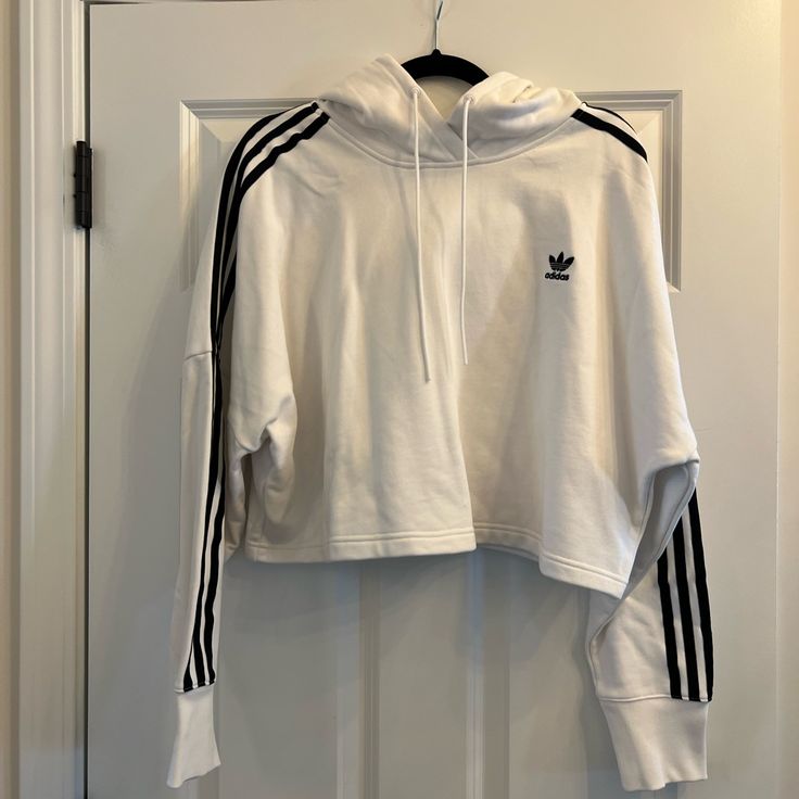 Never Worn Without Tags Adidas Sweatshirt With Drawstring Hood For Spring, Adidas Casual Sweatshirt For Spring, Casual Adidas Sweatshirt For Spring, Urban Sports Hoodie For Spring, White Athleisure Sweatshirt For Spring, Adidas Cotton Hoodie For Spring, Adidas Casual Hoodie With Three Stripes, Casual Adidas Hoodie With Three Stripes, Adidas White Hoodie For Athleisure