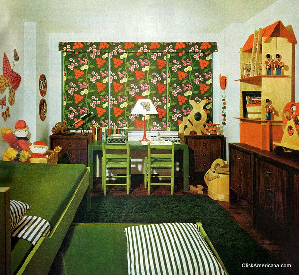 a child's bedroom with green furniture and floral wallpaper