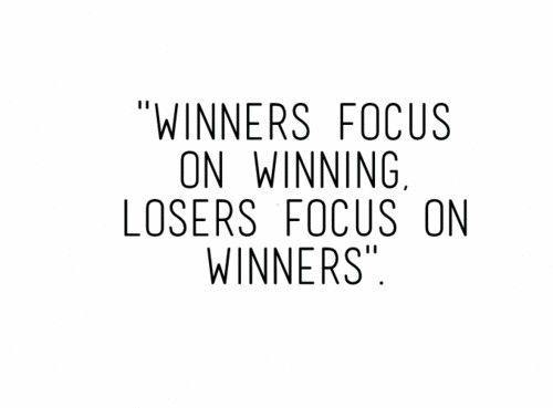 a black and white photo with the words winners focus on winning, loses focus on winners