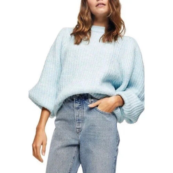 This cozy knit sweater featuring billowy balloon sleeves and a trendy crewneck is equal parts chic and sophisticated. Crewneck Balloon sleeves 62% acrylic, 36% polyester, 2% elastane Machine wash, dry flat Trendy Crewneck, Chunky Cable Knit Sweater, Slouchy Sweater, Statement Sleeves, Cozy Knit Sweater, Cozy Knit, Knitting Women Sweater, Blue Sweater, Chunky Knits Sweater