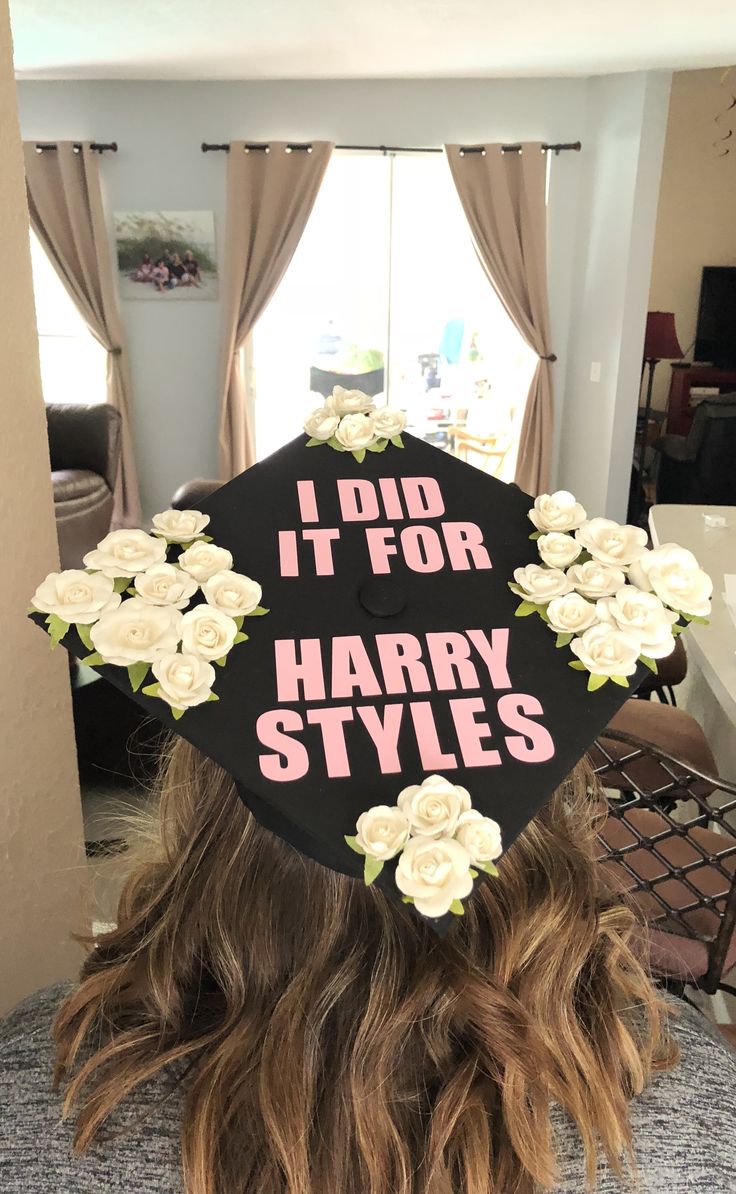 a graduation cap with flowers on it that says i did it for harry styles