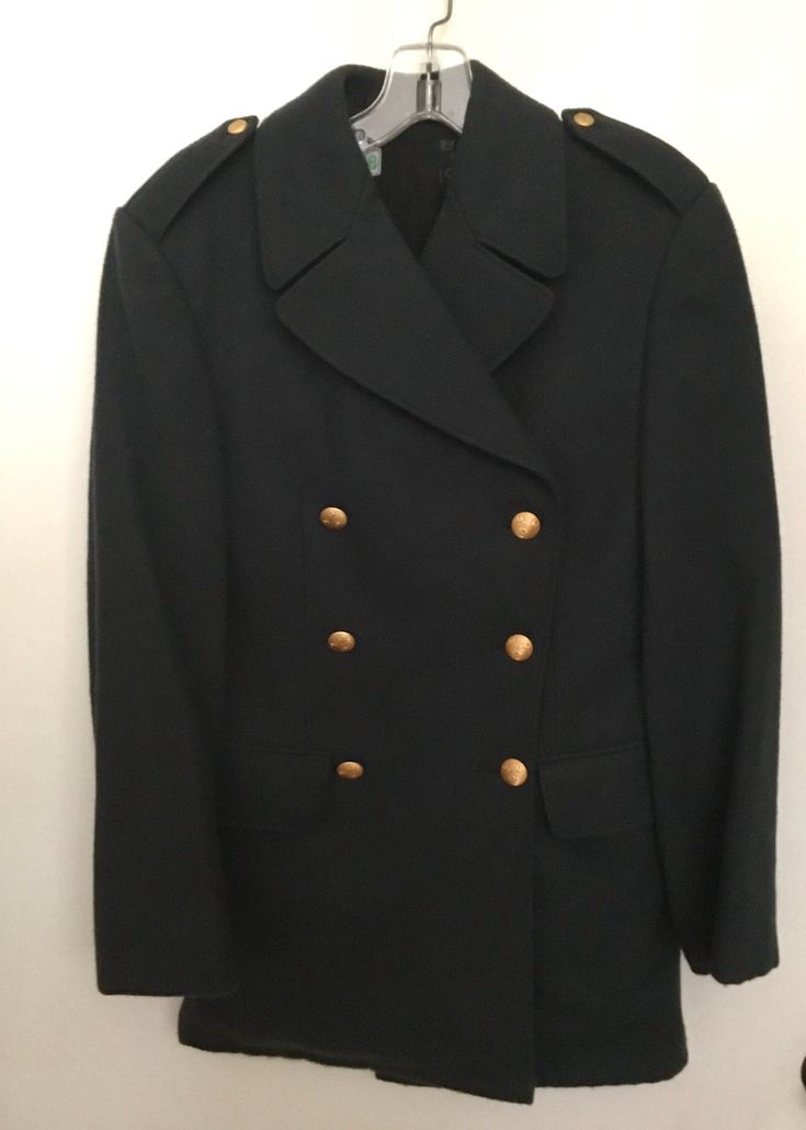 "This coat is amazing! And in amazing shape! Especially for 50 plus years! Made in Sweden (see photos to check tags) this navy heavy wool coat is expertly tailored in the military style. It is double breasted with all the original gold-tone metal buttons  featuring embossed stars. The same buttons are on the epaulettes. The front has two inset pockets with flaps, the back has a suit type vent. The inside is lined in a super soft satiny fabric, probably rayon. The lining is intact with no issues Formal Military Outerwear With Button Closure, Winter Military Style Blazer For Workwear, Military Style Sport Coat For Winter Workwear, Winter Military Style Sport Coat For Workwear, Military Double-breasted Pea Coat With Double Button Closure, Military Wool Double-breasted Pea Coat, Military Style Double-breasted Pea Coat, Double-breasted Military Style Formal Outerwear, Formal Military Double-breasted Outerwear