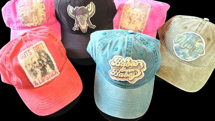 five hats with the same design on them, all in different colors and sizes are shown