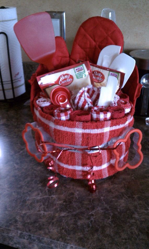 a red basket filled with lots of items on top of a counter