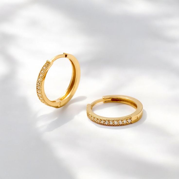 Gold Diamond Huggie Hoop Earrings for Her, 14K Hoop Earring, Huggies Earring, Dainty Hoops Gift for Friend, Geometric Jewelry for Bridesmaid 💜 Details Width  16.56 mm Lenght  16.24 mm Thickness  1.70 mm These hoops are insanely easy to wear and elevate every look, so you can toss them on with jeans and a tee or your Saturday night dress. The best-selling hoops that have become a staple in everyone's eardrobe and one of our most popular styles.  Featuring 14K solid gold for pierced ears, these b Elegant Gold Huggie Earrings With Halo Design, Gold Plated Hoop Earrings For Wedding, Dainty 14k Gold Hoop Earrings For Wedding, 14k Gold Small Hoop Earrings With Halo, 14k Gold Small Hoop Halo Earrings, Yellow Gold Small Hoop Halo Earrings, Yellow Gold Halo Small Hoop Earrings, Gold Huggie Earrings With Halo Design As Gift, Small Hoop Gold Plated Earrings For Wedding