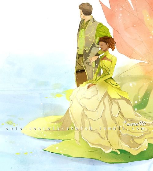 a man and woman dressed up as fairy tale characters sitting on top of a lily pad