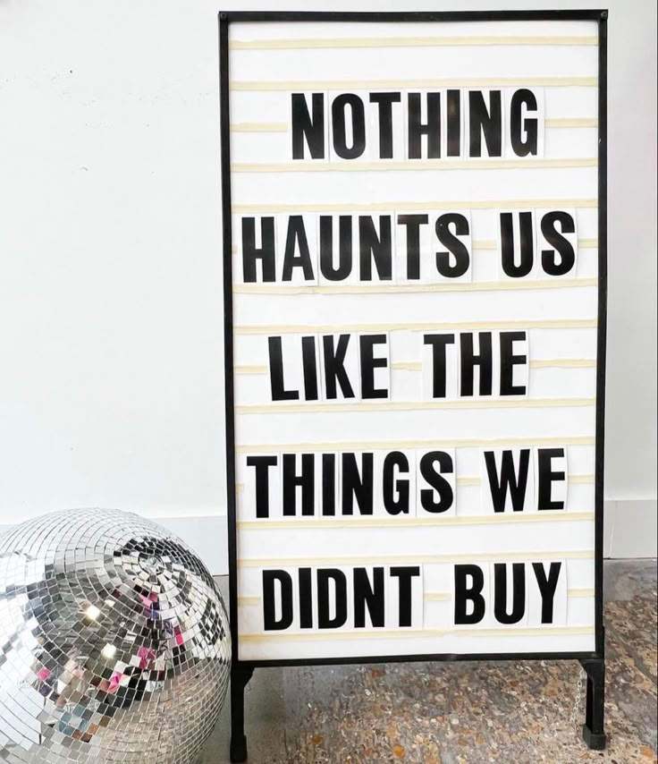 a sign that says nothing haunts us like the things we didn't buy