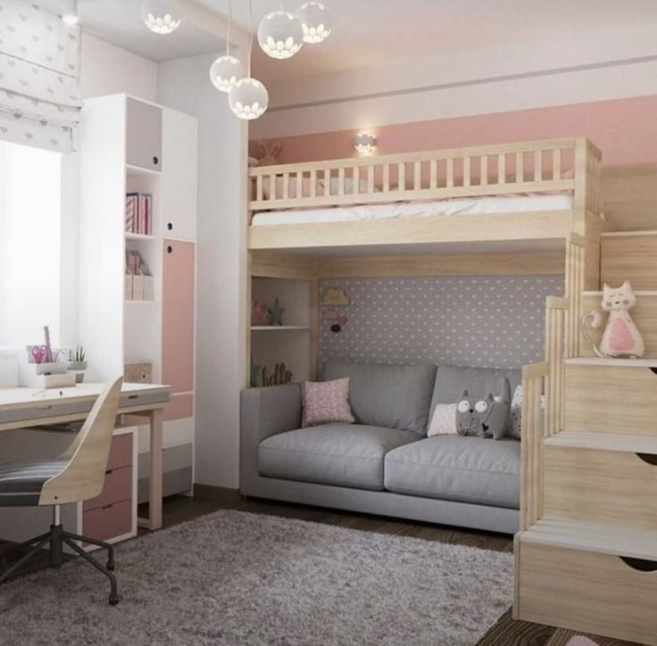 a bedroom with bunk beds, desk and chair