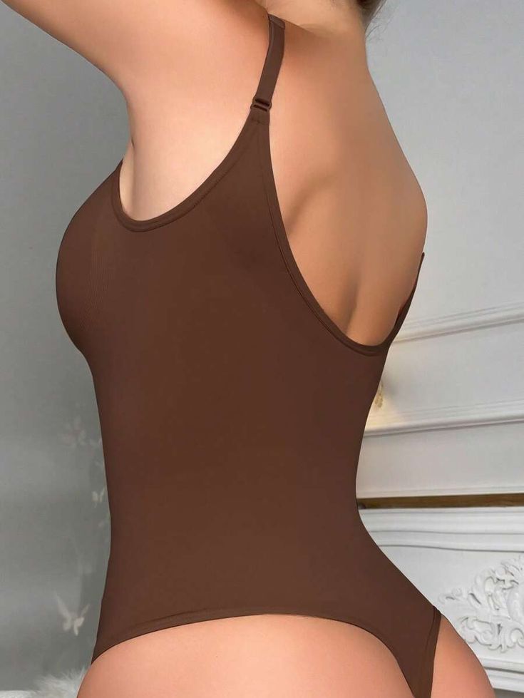 Introducing our Solid Shapewear Thongs Bodysuit with a fusion of comfort and style. Embrace the freedom of a backless design while enjoying gentle control and a light support level. Crafted from high-stretch fabric, it seamlessly accentuates your natural contours. Elevate your casual wear with this essential wardrobe addition. Features: Style: Casual Pattern Type: Plain Type: Thongs Details: Backless Features: Control Support Level: Light Fabric: High Stretch Material: Fabric Size Chart(in): Siz Essential Wardrobe, Natural Contour, Backless Design, The Freedom, Shapewear, Wardrobe Essentials, Light Fabric, Stretch Fabric, Style Casual