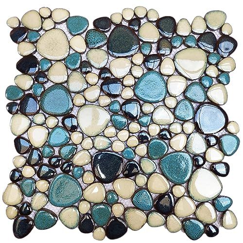 a mosaic tile with blue and white pebbles on it