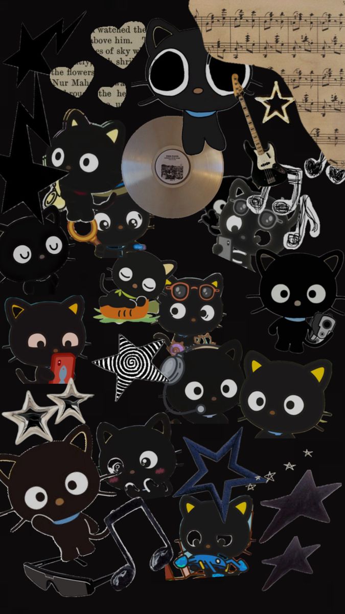 a bunch of stickers that are on top of a sheet of music paper,