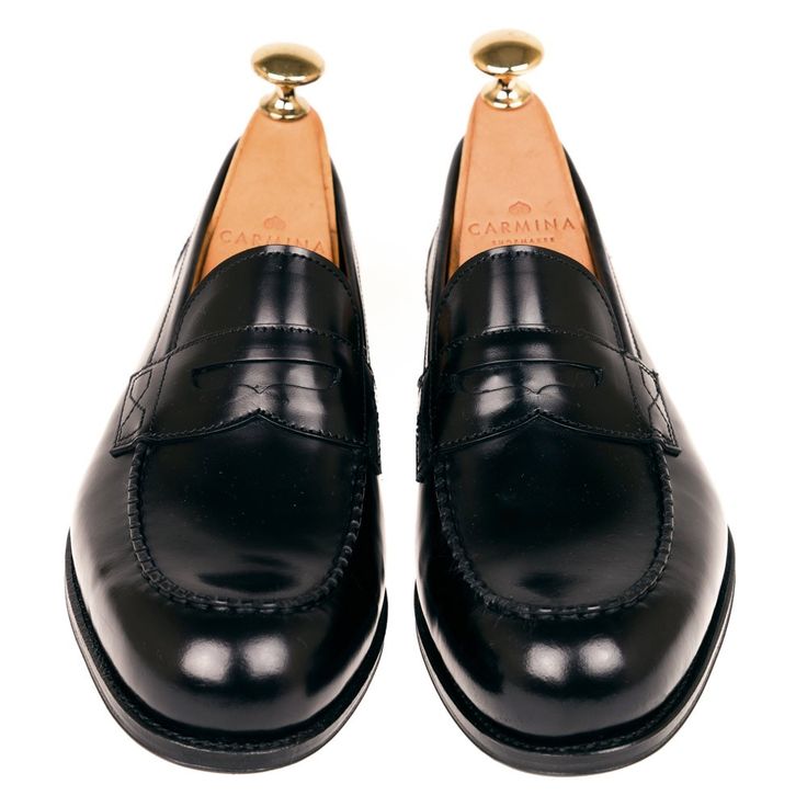 BLACK PENNY LOAFERS FOR WOMEN Black Wingtip Loafers For Galas, Timeless Black Slip-on Loafers, Black Luxury Wingtip Loafers, Luxury Black Wingtip Loafers, Black Almond Toe Loafers With Leather Sole, Black Closed Toe Leather Shoes For Galas, Elegant Loafers With Round Toe And Rubber Heel Cap, Classic Black Dress Shoes With Flat Heel, Luxury Black Tassel Loafers With Leather Sole