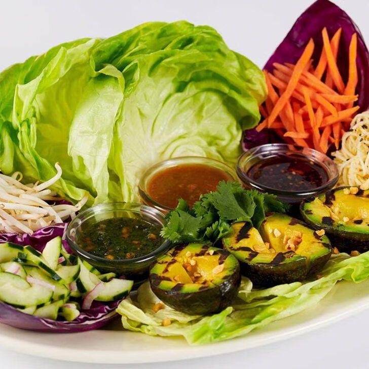 lettuce, carrots and other vegetables on a plate