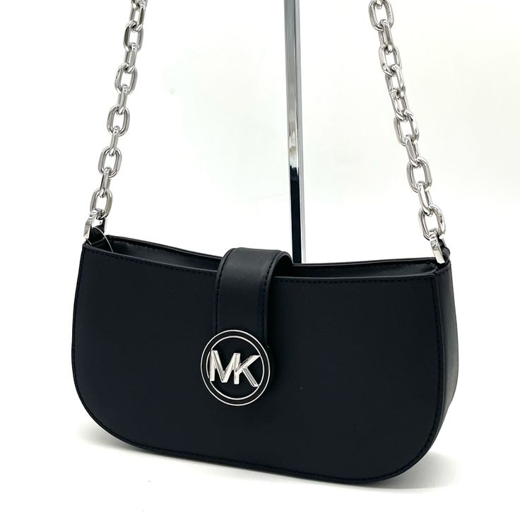 Brand New With Tag Michael Kors Carmen Small Pouchette Crossbody Bag Color: Black Material: Saffiano Silver-Tone Hardware Chain Handle Flap With Magnetic Snap Button Closure Interior Features: 1 Wall Pocket 9.25”W X 4.5”H X 2.75”D Silver Evening Bag With Metal Logo, Silver Bags With Logo Hardware For Formal Occasions, Formal Silver Shoulder Bag With Logo Hardware, Formal Silver Bags With Logo Hardware, Black Bag With Silver-tone Logo For Everyday Use, Michael Kors Evening Bags With Logo Hardware, Formal Crossbody Shoulder Bag With Silver-tone Logo Plaque, Classic Shoulder Bag With Silver-tone Logo Plaque, Chic Black Bag With Silver-tone Logo Plaque