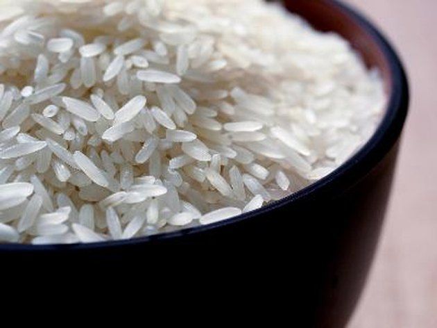 white rice in a black bowl on a table