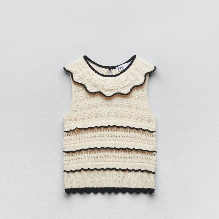 Brand New Small Size Cream - Black Color Elegant Beige Pointelle Knit Top, Chic Cream Knit Top For Spring, Elegant Beige Knitted Top, Elegant Cream Knitted Top, Chic Cream Knit Top, Chic Beige Pointelle Knit Top, Chic Textured Knit Cream Top, Chic Cream Textured Knit Top, Chic Textured Knit Top In Cream