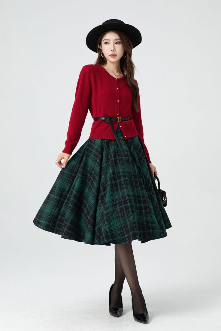 This women green plaid midi wool circle skirt is certain to add an extra layer of sophistication to any ensemble, making it a must-have wardrobe staple for those who value elegance and quality. DETAIL * 30% wool, 30% fiber, 40% polyester * Fully satiny lining, more nice to the touch body * Two side seam pockets * Back zipper closure * Midi wool skirt * Circle wool skirt * Skater wool skirt * High waist skirt * For autumn and winter * Party skirt * Dry clean * Lean More about the items From the FAQs on the page bottom More color: https://www.etsy.com/listing/1539858126 MODEL SIZE Bust 85 cm(33.4") Waist 67 cm(26.7") Height 168cm (5' 6") She wears size XS Choose CUSTOM Order if you * Need a better fit * Can't find your size in our size Chart * Change the Style * Chang the Length * Your Heigh Elegant Plaid Knee-length Skirt, Elegant Knee-length Plaid Skirt, Green Winter Midi Skirt, Green Midi Skirt For Winter, Elegant Plaid Winter Skirt, Winter Green Pleated Skirt, Winter Green Flared Skirt, Winter Flared Green Skirt, Green Pleated Skirt For Winter