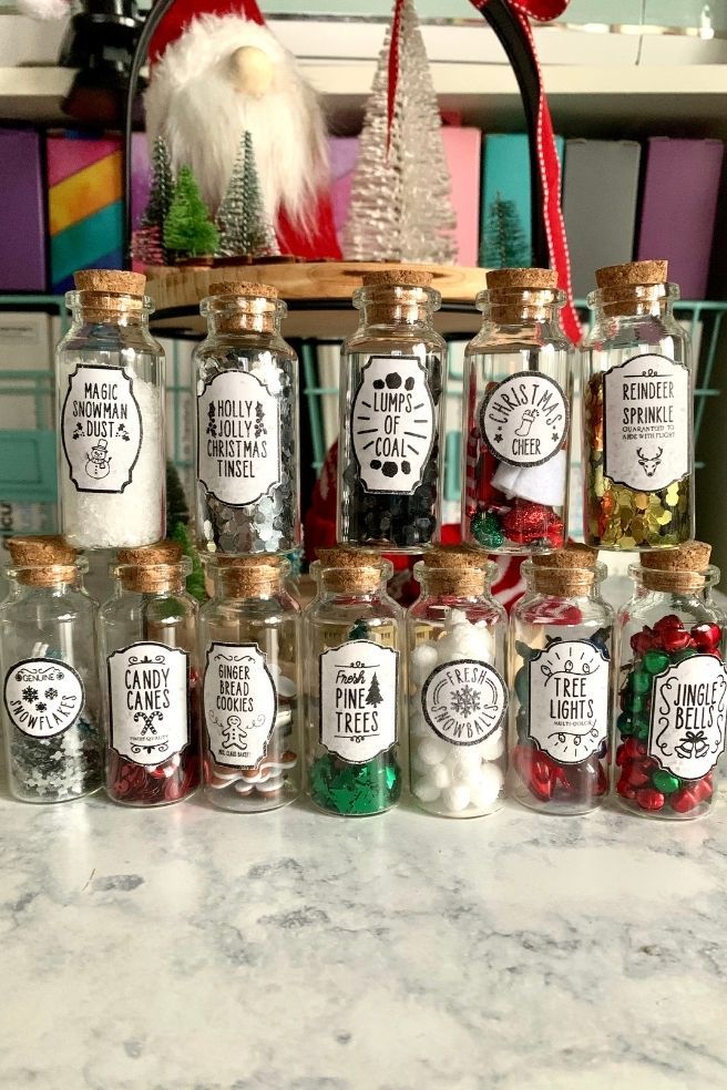 a shelf filled with lots of christmas spices