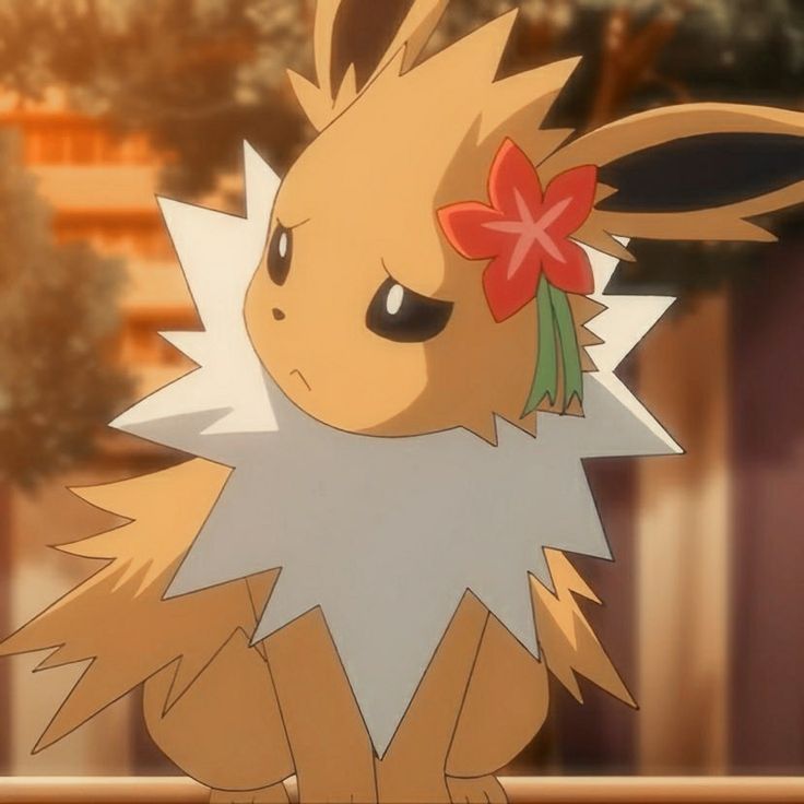 an animated image of a pikachu with a flower in its hair