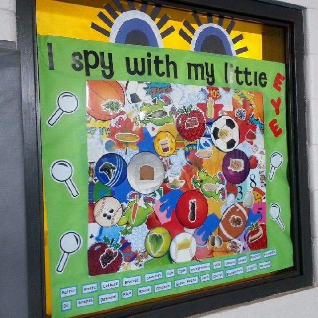 there is a poster on the wall that says i spy with my little