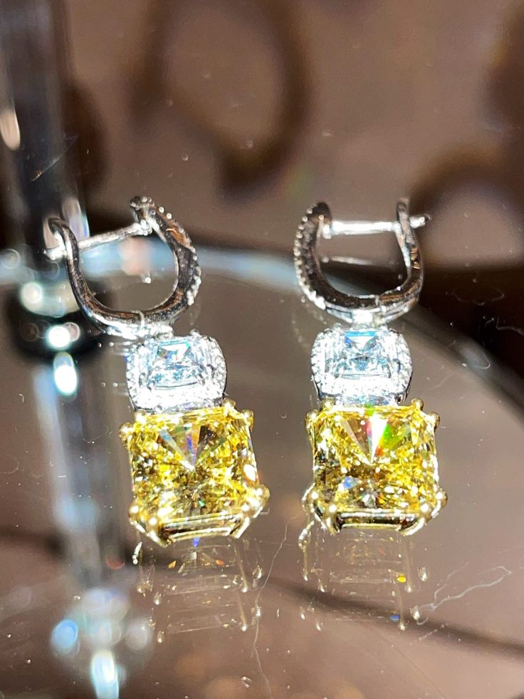 6ct each laser AAAAA grade cz fancy yellow princess cut set in 925 Sterling silver laser white gold plated hand made earrings. One of a kind, Luxury Gold Sparkling Diamond Earrings, Luxury Yellow Gold Diamond Chandelier Earrings, Canary Yellow Diamonds, Yellow Diamond Earring, Canary Yellow, Cz Earrings, Yellow Diamond, How To Make Earrings, Princess Cut