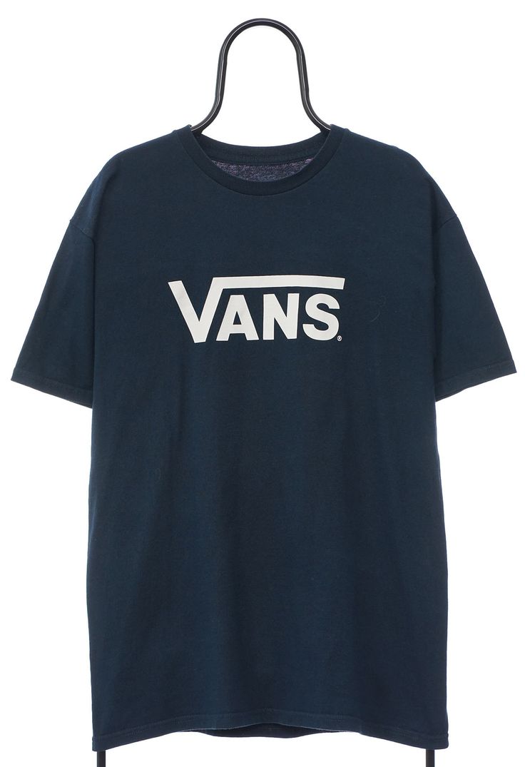 Navy tee with white spellout Vans logo across the chest. Size (Approx. in: cm: Pit to Pit: 54, Length: 74 ) Navy Blue Vans, Vans Shirt, Vans Logo, T Shirt Picture, Graphic Logo, Fleece Coat, Mens Graphic Tee, Chest Size, Mens Clothing Styles