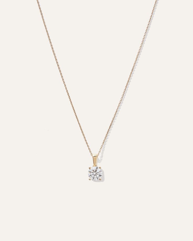 Crafted from 14K recycled gold, this pendant is designed with simplicity in mind featuring a solitaire round lab grown diamond at its center. The center stone is expertly set in a classic four-prong setting, allowing maximum light to enter and reflect fro Large Diamond Necklace, 14k Gold Solitaire Necklace With Cable Chain, Minimalist Single Diamond Jewelry For Everyday Luxury, Timeless Rose Gold Cable Chain Jewelry, Timeless Rose Gold Jewelry With Cable Chain, Fine Jewelry Solitaire Necklace With Adjustable Chain, Classic Diamond White Jewelry With Adjustable Chain, Rose Gold Diamond Jewelry With Cable Chain, Single Diamond Round Pendant Necklace For Everyday Luxury