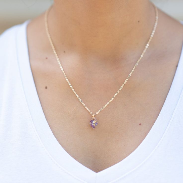 Handcrafted with dried lilac flowers, this Flower Pendant Necklace is a gorgeous keepsake gift that encapsulates the beauty of Tasmania's nature.  The Lilac pressed flower necklace has an adjustable chain and is elegant and dainty - perfect for everyday wear, complete with a dainty resin flower pendant. -14k Gold Plated or Silver Plated -Tarnish Resistant Chain (nickel free). -45cm Length 2.0mm Width Oval Link Chain -Adjustable and extendable  -Handmade in Tasmania using locally grown dried flowers *To preserve your botanical jewellery please avoid wearing in water and store out of direct sunlight to maintain the colour quality of the flowers.* Follow our Instagram @littleflowerearrings for more about our brand, The Little Flower Handmade and all our resin flower jewelry! Delicate Amethyst Jewelry For Gifts, Delicate Lavender Gemstone Jewelry, Lavender Jewelry With Pressed Flowers For Gifts, Purple 14k Gold Filled Jewelry As A Gift, Purple 14k Gold Filled Jewelry Gift, Delicate Lavender Necklace For Gift, Lavender Dainty Birthstone Jewelry, Dainty Purple Jewelry As A Gift For Her, Dainty Lavender Birthstone Jewelry