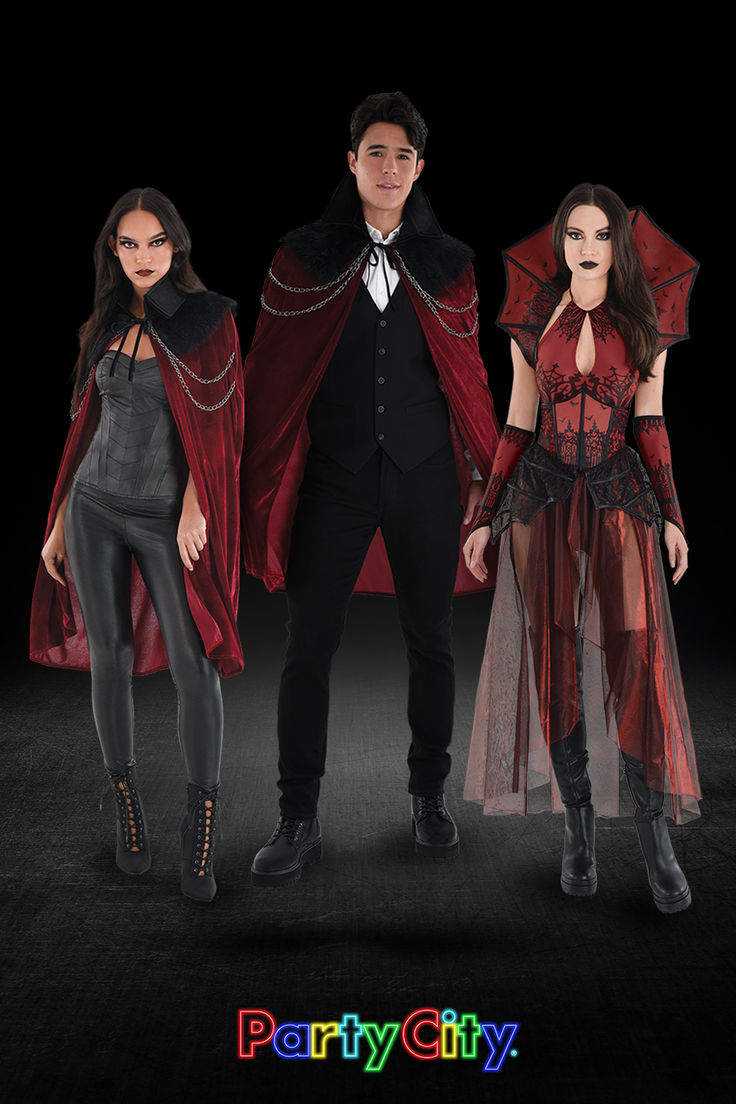 two people dressed up as dracula and vampire girl