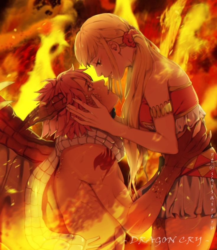 two anime characters are kissing in front of a blazing background with fire and flames behind them