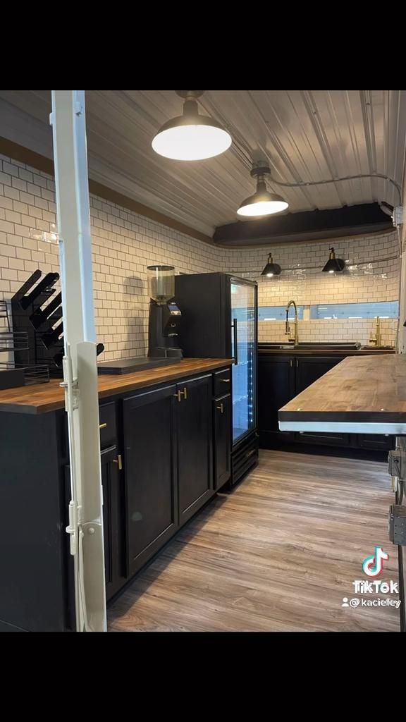 the kitchen is clean and ready to be used as a bar or restaurant counter top