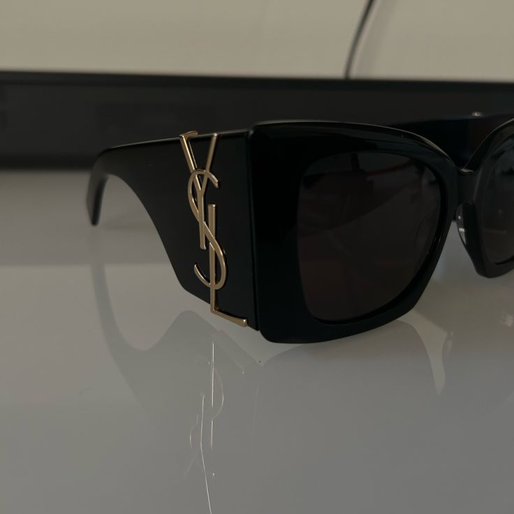 Yves Saint Laurent Sunglasses Brand New Never Worn Black With Gold Accents Black Designer Sunglasses, Yves Saint Laurent Glasses, Ysl Glasses Sunglasses, Yves Saint Laurent Sunglasses, Ysl Sunglasses Women, Yves Saint Laurent Aesthetic, Ysl Glasses, Ysl Accessories, Black And Gold Accessories