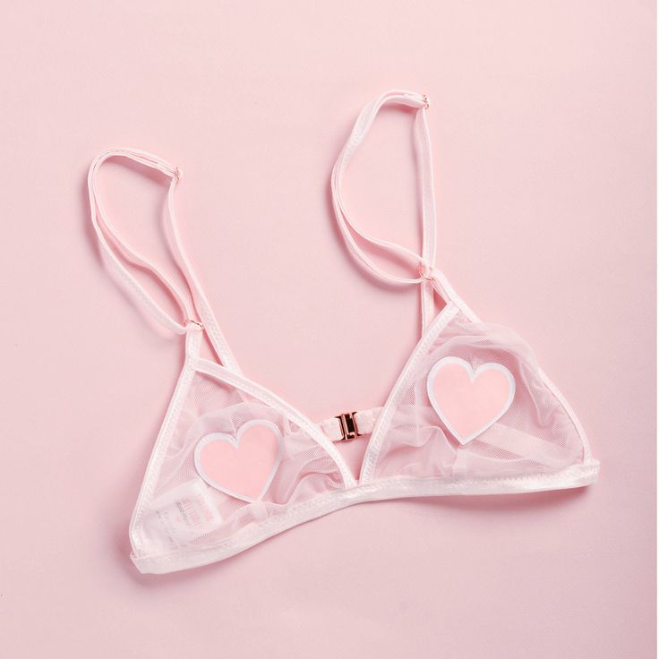 Blush triangle bralette with heart detailing and rose gold hardware. This listing is JUST for the bralette. BRALETTE: Adjustable straps, rose gold zinc alloy (metal) hardware. The Jordan de Ruiter collection is hand crafted in Canada in-studio & by small run manufacturers. Made to order, please see the shipping section for current turnaround on this item. Bralette Sizing S/M: Band 32-34, Cups B to C M/L: Band 36 - 38, Cups B to C XL: Band 40-42, Cups B to C Custom size: Please send your standard Pinterest Cute, Fashion Design Inspiration, Lingerie Design, Bra Items, Hot Lingerie, Cute Bras, Pink Bralette, Cute Lingerie, Triangle Bralette