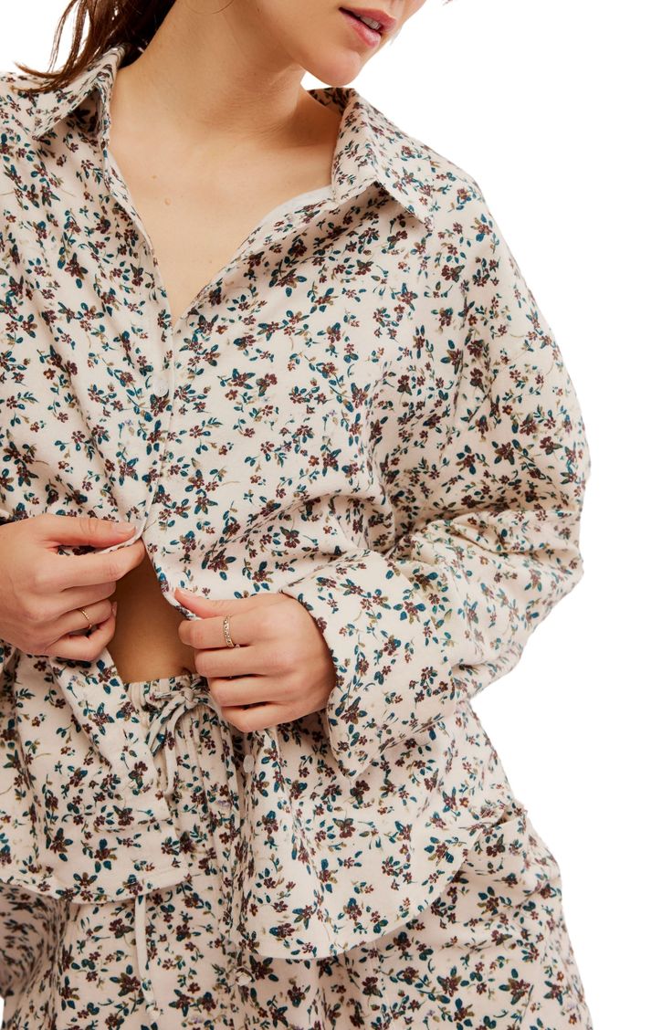 These floral-print knit pajamas featuring a high-low button-up top and drawstring shorts are cut from pure cotton to keep you cool all night long. Top: 25 1/2" front length; 30" back length (size Medium) Bottoms: 3" inseam; 27" leg opening; 13 1/2" front rise; 17 1/2" back rise (size Medium) Top has spread collar; long sleeves 100% cotton Machine wash, tumble dry Imported White Floral Print Pajama Shorts For Loungewear, Floral Print Relaxed Fit Sleep Top, Beige Relaxed Fit Sleepwear For Spring, Floral Print Relaxed Fit Tops For Loungewear, Casual Floral Print Pajama Shorts For Sleep, Floral Print Relaxed Top For Pajama Party, Cozy Relaxed Fit Sleepwear For Spring, Cotton Button-up Sleepwear For Lounging, Cotton Floral Print Sleep Top