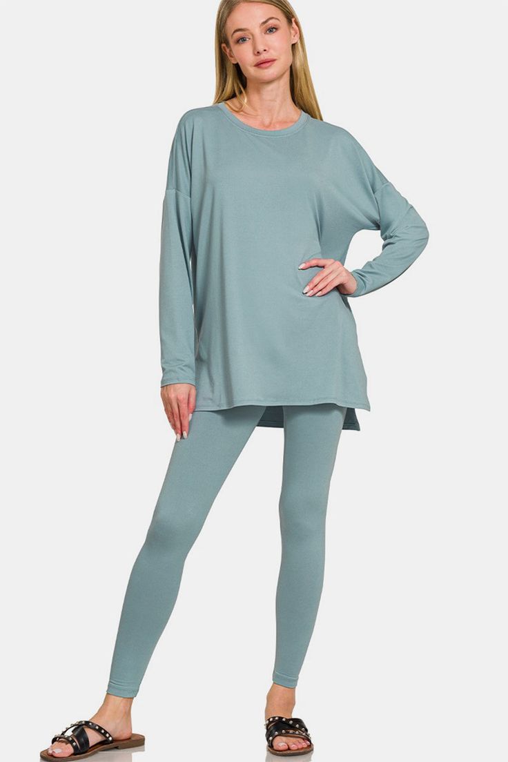 The brushed microfiber top and leggings lounge set is the epitome of comfort and style for your lounging needs. Crafted from soft and cozy microfiber fabric, this set offers a luxurious feel against the skin. The top provides a relaxed fit, while the leggings offer a stretchy and form-fitting silhouette for ultimate comfort. This lounge set is perfect for cozy nights in or casual outings, providing a versatile and chic look. Whether you're relaxing at home or running errands, this set ensures th Cozy Fits, Loungewear Set, Lounge Set, Top Fabric, Lounge Sets, Stretchy Material, Running Errands, Jumpsuit Dress, Outfit Sets